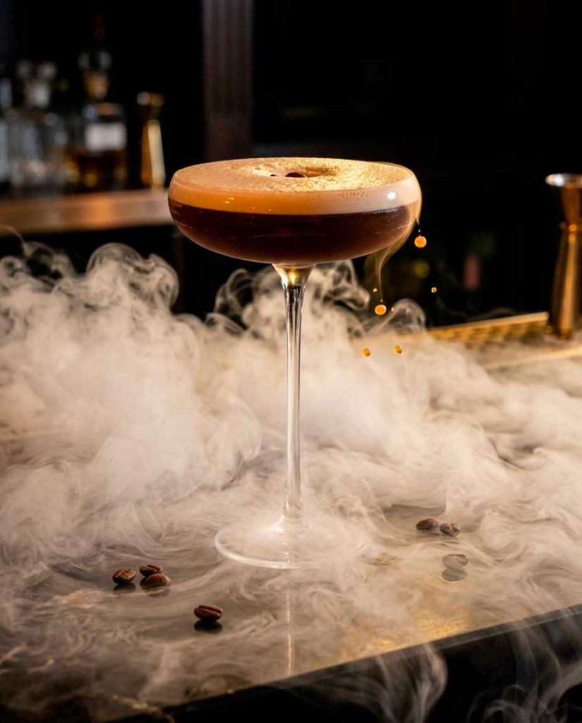 Smoked craft cocktail with aromatic vapor at Mojo Hookah Lounge Midtown Houston